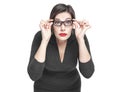 Plus size woman in glasses looking on you isolated Royalty Free Stock Photo