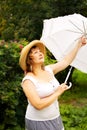 Plus size woman having relax in the park