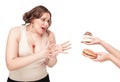 Plus size woman seduced with hamburger and pastry Royalty Free Stock Photo