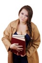 Plus size woman with thick volumes of books