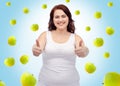 Plus size woman in underwear showing thumbs up Royalty Free Stock Photo