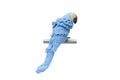 Blue plush macaw on a perch