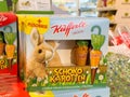 Plush rabbit with chocolate carrots display in store Royalty Free Stock Photo