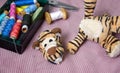 Plush tigger with a torn head. Torn toy