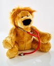 Plush toy lion doctor with stethoscope