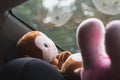 Plush toys in front of the rear window of a car Royalty Free Stock Photo