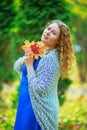 Plussize model in the autumn park