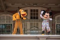 Pluto and Mickey Mouse waving from the balcony at Walt Disney World Railroad at Magic Kingdom 342 Royalty Free Stock Photo