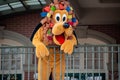 Pluto waving from the balcony at Walt Disney World Railroad in Halloween season at Magic Kingdom 5 Royalty Free Stock Photo