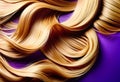 Ply of shiny, healthy, glowing blonde hair with wavy styling on purple background