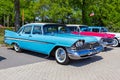 1959 Plymouth Belvedere vintage classic car parked together with other oldtimers. Den Bosch, The Netherlands - May 8, 2016