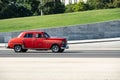 Plymouth Deluxe 1950 sedan in streets of Havana, Cuba with motion blur effect