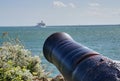 Large Canon Aimed at Passenger Ferry in Plymouth Harbor England Royalty Free Stock Photo