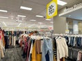 Clearance and sale section of womens clothing for sale at a Target store