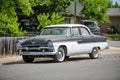 A Plymouth Savoy parked on the street