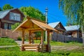 Cozy wooden well in Plyos town Royalty Free Stock Photo