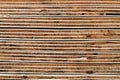 Plywood Background: Weathered Cross Section of Piled Plywood Panels - Detail