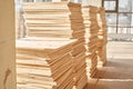 Plywood boards on the industry. layer of plywood, Construction site preparation for the flooring of the parquet floor Royalty Free Stock Photo