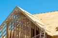 plywood house rafters roof wooden house framework building site board Royalty Free Stock Photo