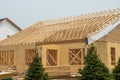 plywood house rafters roof wooden house framework building site board Royalty Free Stock Photo