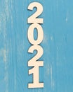 Plywood laser cutted numbers 2021. Merry Christmas and happy new year concept.