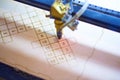 Plywood laser cutting process close up