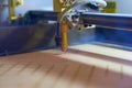 Plywood laser cutting process close up