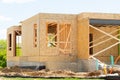 plywood walls of a new house development truss unfinished framework Royalty Free Stock Photo