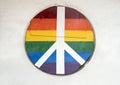 Plywood window protection with gay pride colors and peace sign on the side of JR`s Bar and Grill on Cedar Springs Rd., Dallas