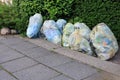 PLÃÂ¶N, GERMANY - Jun 24, 2020: yellow bags with plastic pvc rubbish, waste, trash for recycling, Germany