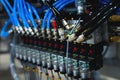 Pneumatic control board in production. Distributor of pneumatic control lines. Industrial photo Royalty Free Stock Photo