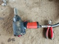 Pneumatic hammer on concrete floor close up shot Royalty Free Stock Photo