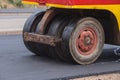 Pneumatic tyred roller compactor at asphalt road