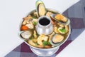 Po-Tak Spicy Sour Seafood Soup contains shrimp