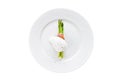 Poached egg on asparagus in bacon. Isolated on white background. Royalty Free Stock Photo