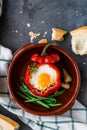 Poached egg with baked bell pepper and bread Royalty Free Stock Photo