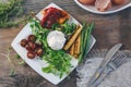 Poached egg with corn vegetables, grilled pepper, spinach, arugula, green beans and baby salad. Close up. Natural food Royalty Free Stock Photo