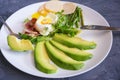 Poached egg with corn vegetables, grilled pepper, spinach, arugula, green beans and baby salad. Natural food. Scandinavian Breakfa Royalty Free Stock Photo