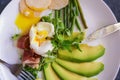 Poached egg with corn vegetables, grilled pepper, spinach, arugula, green beans and baby salad. Natural food. Scandinavian Breakfa Royalty Free Stock Photo