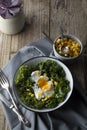 Poached eggs with Kale lettuce and corn salad. Healthy breakfast or dinner. Lose weigh, clean eating