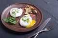 Poached eggs with parsley and mushrooms Royalty Free Stock Photo