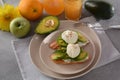 Poached eggs and sandwiches with avocado. Sliced avocado and egg on toasted bread Royalty Free Stock Photo