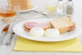 Poached eggs toast and bacon Royalty Free Stock Photo