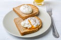 Poached Eggs on Wholegrain Bread Toasts Royalty Free Stock Photo