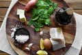 Fish, spinach and egg salad on a dark background, top view. Delicious healthy food concept Royalty Free Stock Photo