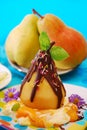 Poached pear with chocolate for child Royalty Free Stock Photo