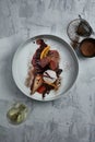 Poached pear with an ice cream in red wine sauce Royalty Free Stock Photo