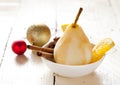 Poached pear in orange juice Royalty Free Stock Photo