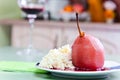 Poached pear with red wine sauce Royalty Free Stock Photo