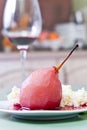 Poached pear with red wine sauce Royalty Free Stock Photo